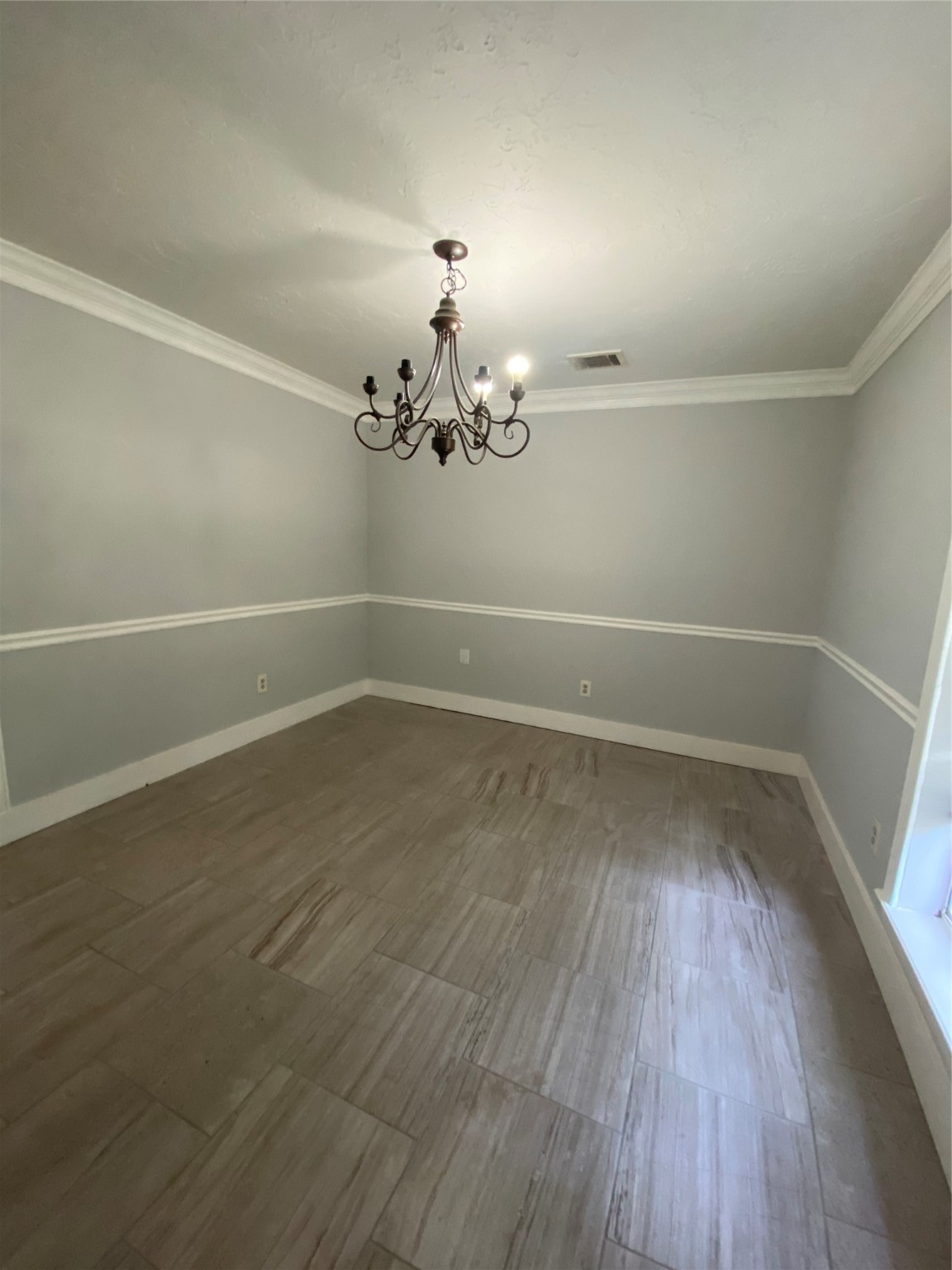 902 Appomattox Drive Spring, TX 77380 - Photo 7 of 18 wooden floor in an empty room with a window