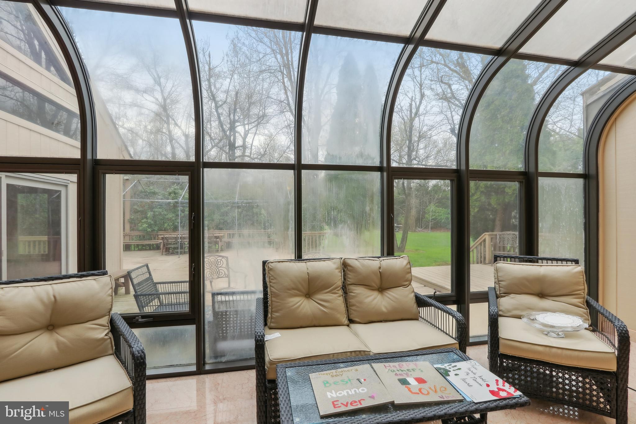 27 Cannon Range Road Milmay, NJ 08340 - Photo 33 of 95 a living room with furniture and a floor to ceiling window