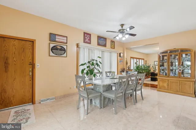 a bed room with furniture and a flat screen tv