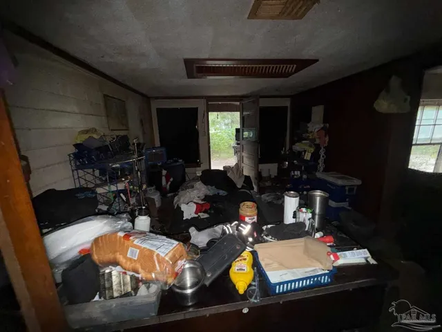 a room with furniture and a window