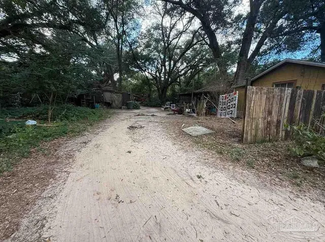 a view of backyard with green space