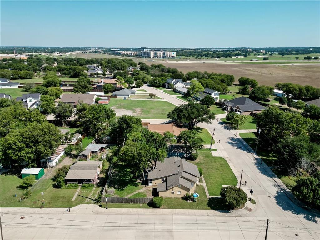 401 Main Street Roanoke, TX 76262 - Photo 3 of 10 a view of a city