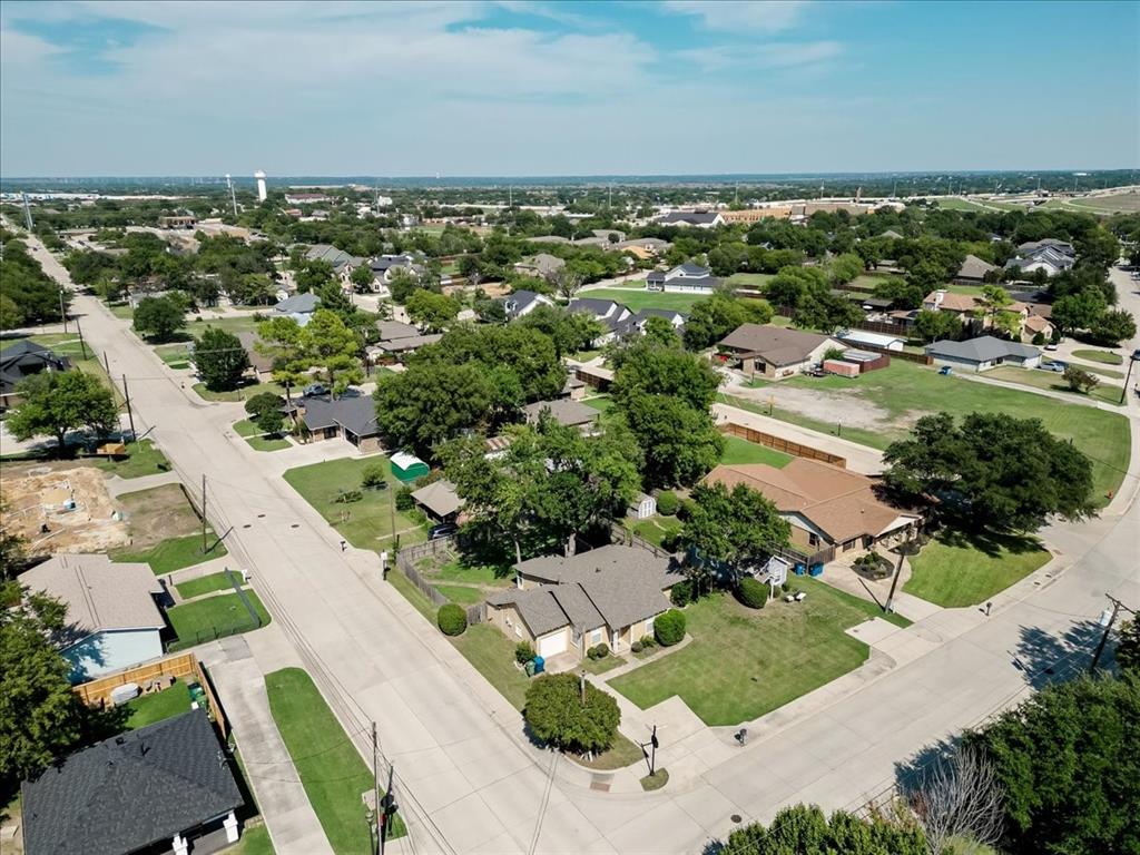 401 Main Street Roanoke, TX 76262 - Photo 4 of 10 an aerial view of residential houses with outdoor space