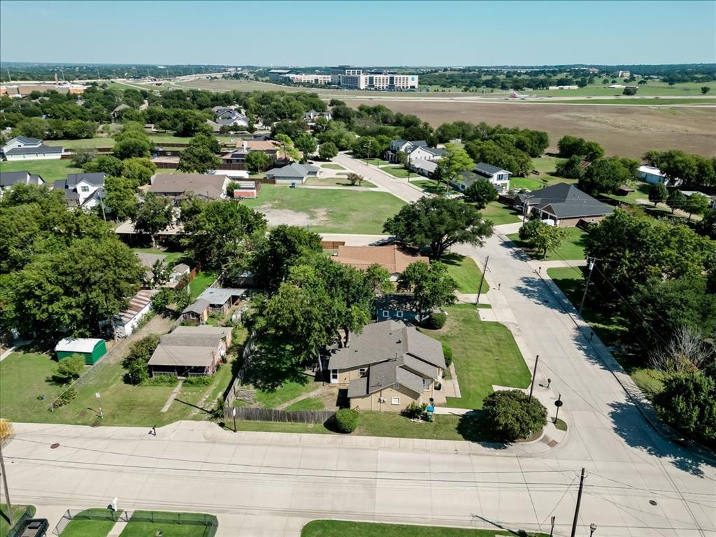401 Main Street Roanoke, TX 76262 - Photo 9 of 10 an aerial view of residential houses with outdoor space and river
