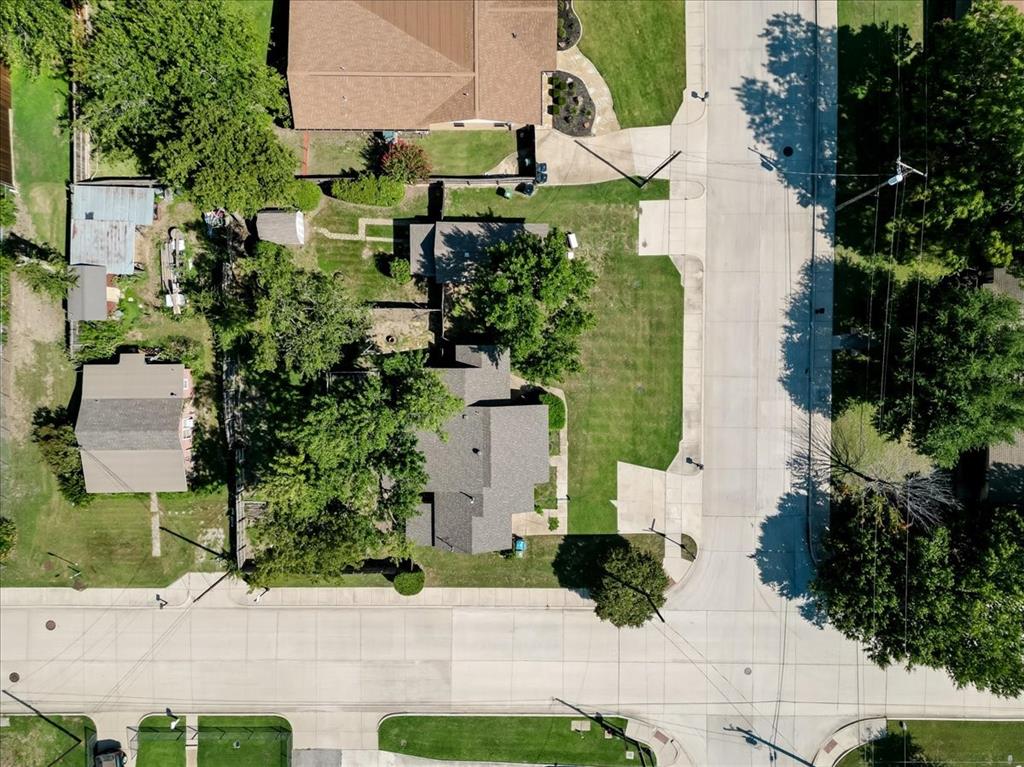 401 Main Street Roanoke, TX 76262 - Photo 10 of 10 an aerial view of a house with a yard and plants