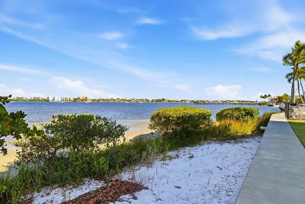 a view of a lake with beach