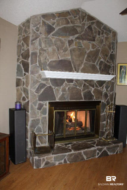 10375 Russ Road Daphne, AL 36526 - Photo 21 of 25 Gas log fireplace in living room