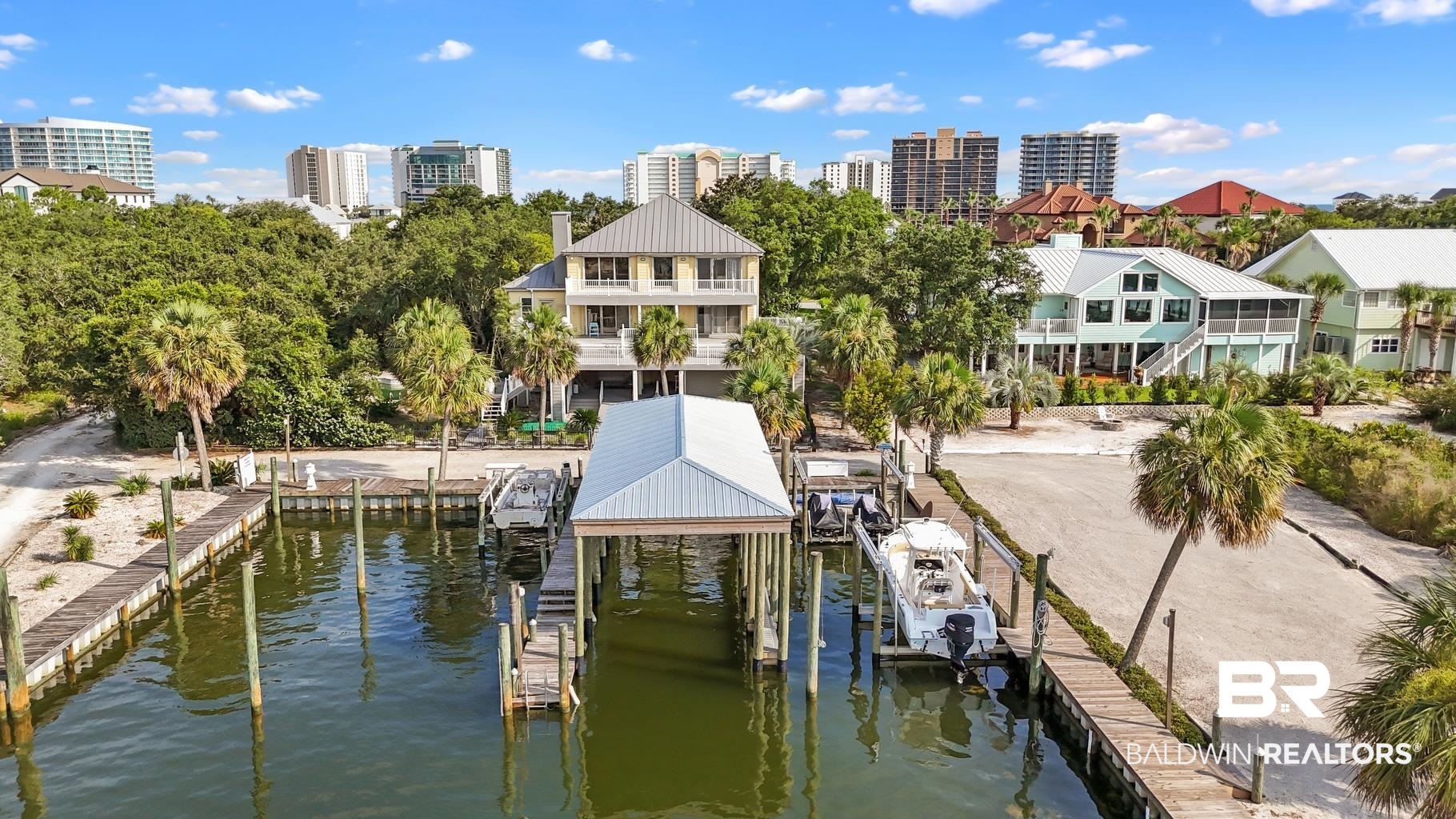 29255 Ono Boulevard Orange Beach, AL 36561 - Photo 1 of 43 Dock area with boat lift and a water view