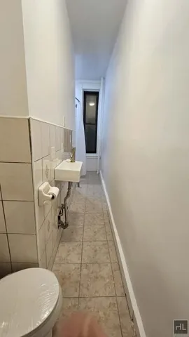 a bathroom with a sink and a toilet