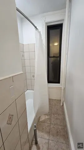 a view of car parked on the street side