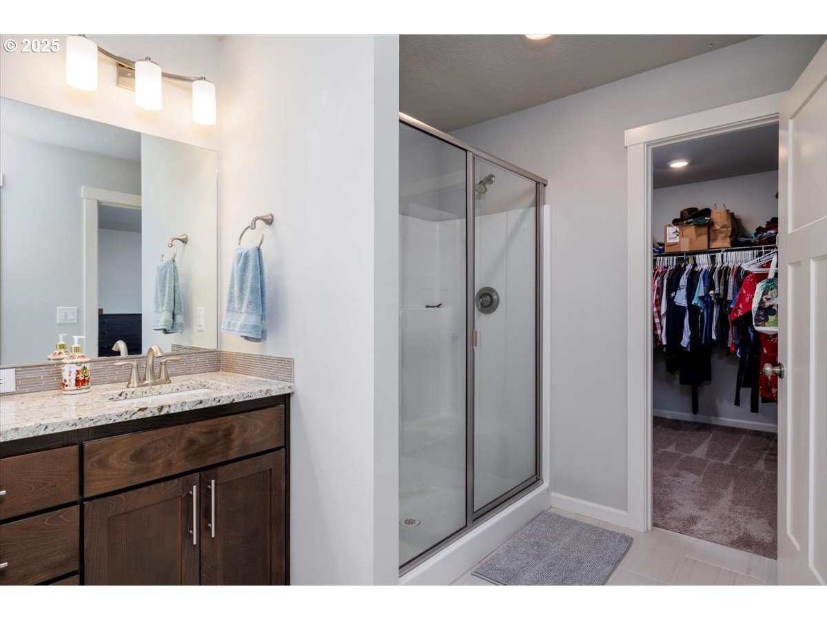 15556 Southeast Flavel Street Portland, OR 97236 - Photo 25 of 37 Owner's Suite Bathroom