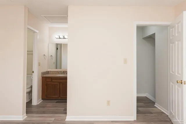 a view of a room that has a large window