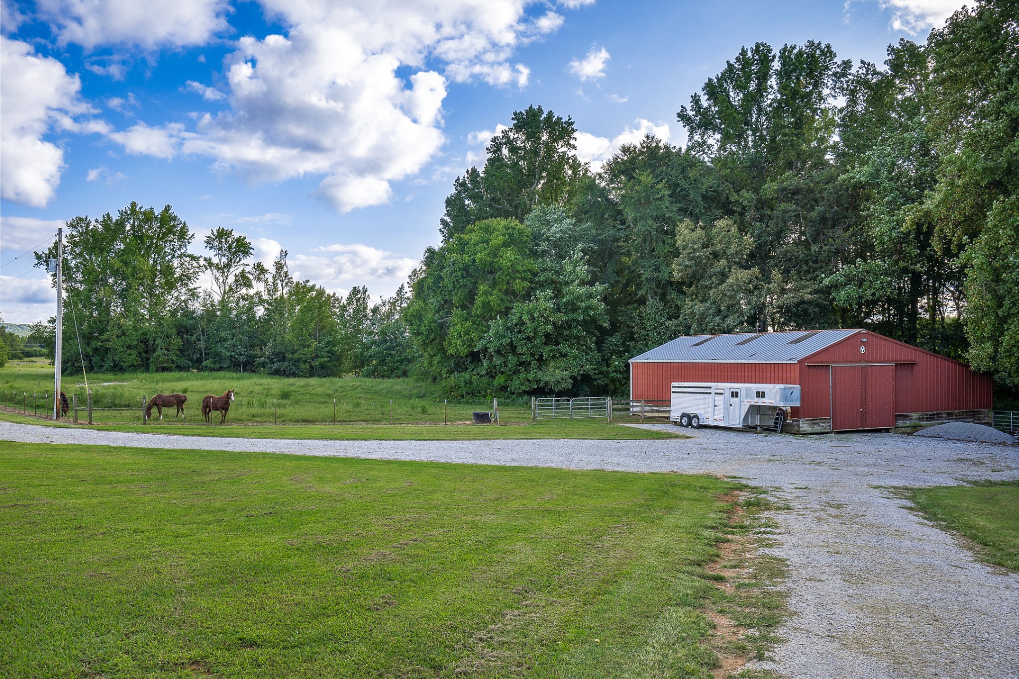 380 George Wright Road Morrison, TN 37357 - Photo 56 of 69 a view of a swimming pool with lawn chairs under an umbrella