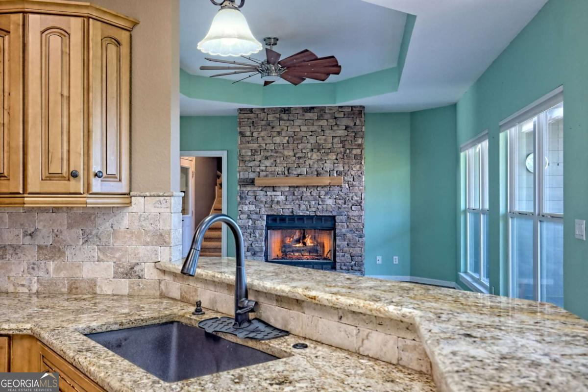 1279 Harris Ridge Road, Unit 24 Young Harris, GA 30582 - Photo 18 of 81 a kitchen with a sink and a fireplace