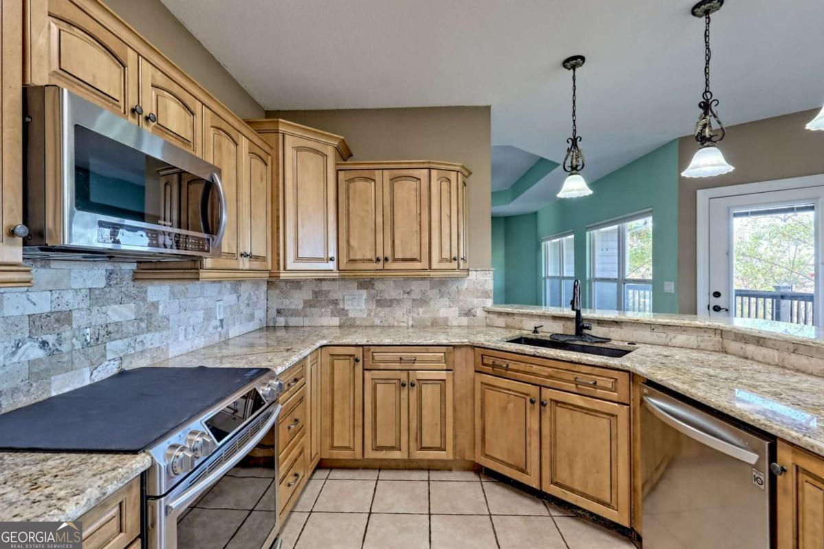 1279 Harris Ridge Road, Unit 24 Young Harris, GA 30582 - Photo 19 of 81 a kitchen with a sink stove and microwave