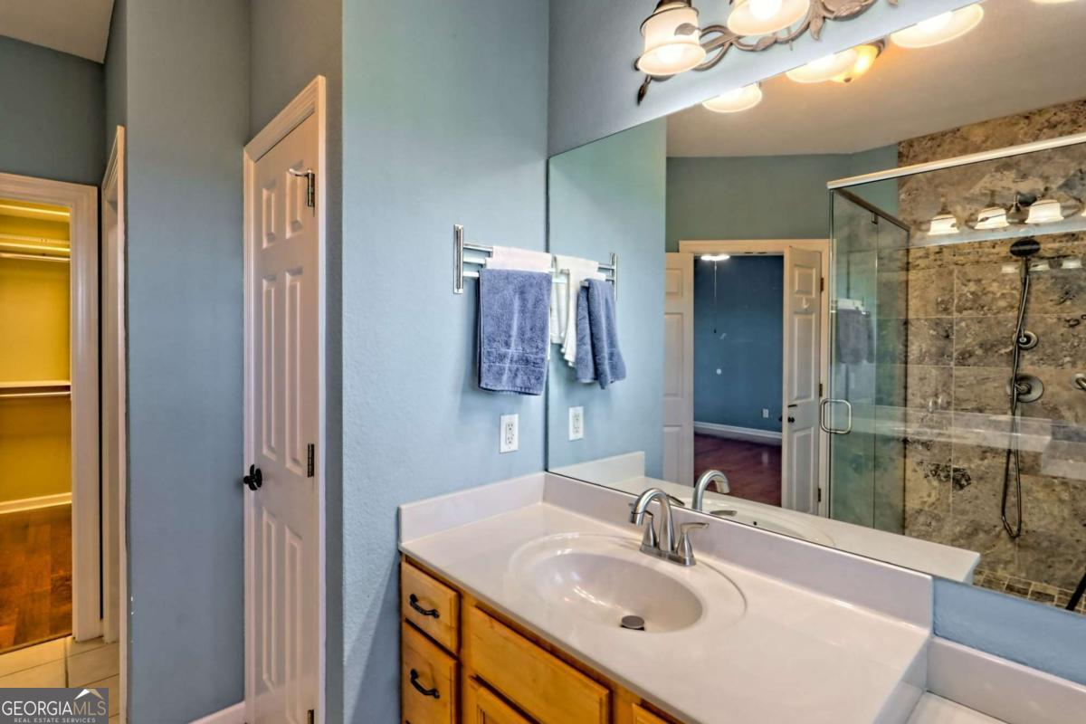 1279 Harris Ridge Road, Unit 24 Young Harris, GA 30582 - Photo 31 of 81 a bathroom with a sink and a mirror