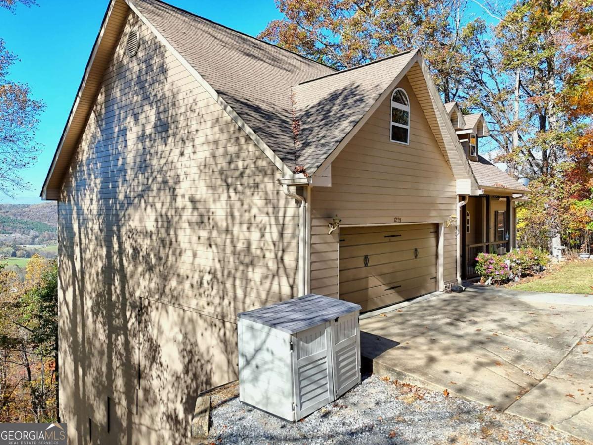 1279 Harris Ridge Road, Unit 24 Young Harris, GA 30582 - Photo 76 of 81 a view of a house with a yard