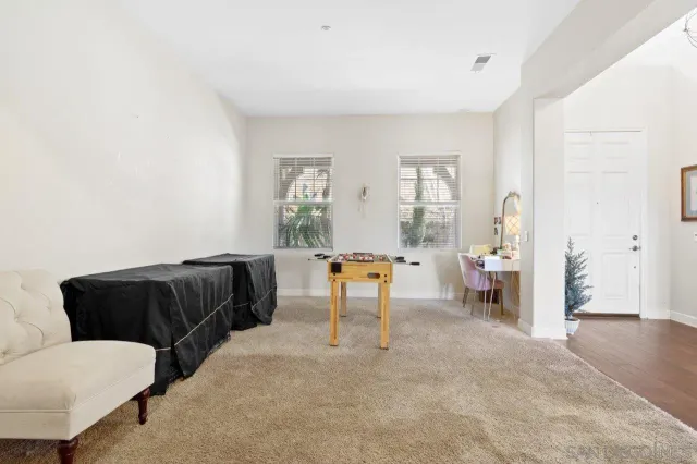 a bathroom with a sink a mirror and a shower curtain