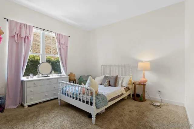 a kitchen with stainless steel appliances a refrigerator a sink a stove and cabinets