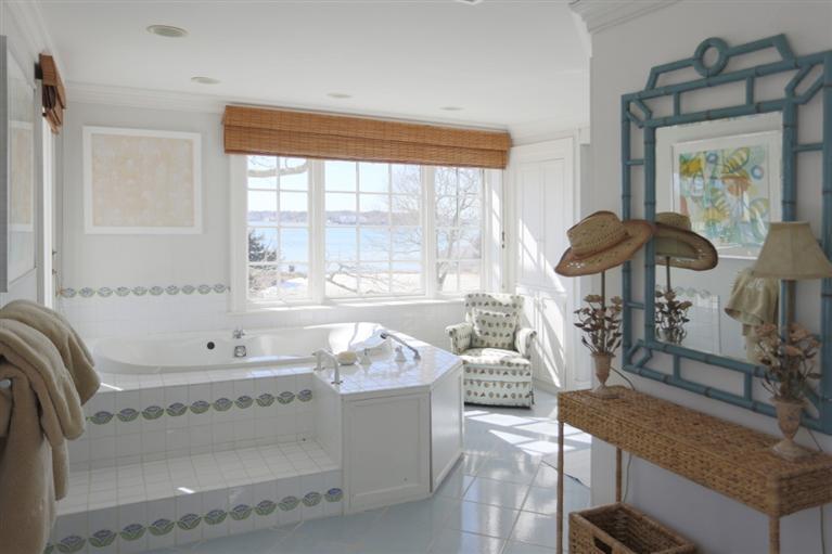 265 Seapuit Road Osterville, MA 02655 - Photo 21 of 30 a living room with furniture and a large window