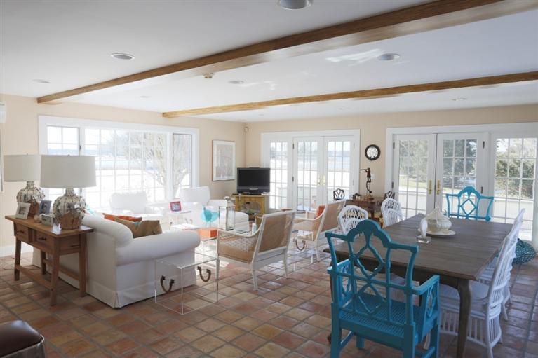 265 Seapuit Road Osterville, MA 02655 - Photo 26 of 30 a living room with fireplace furniture and a large window
