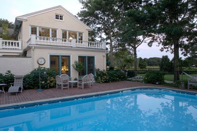 265 Seapuit Road Osterville, MA 02655 - Photo 3 of 30 a front view of house with yard and outdoor seating
