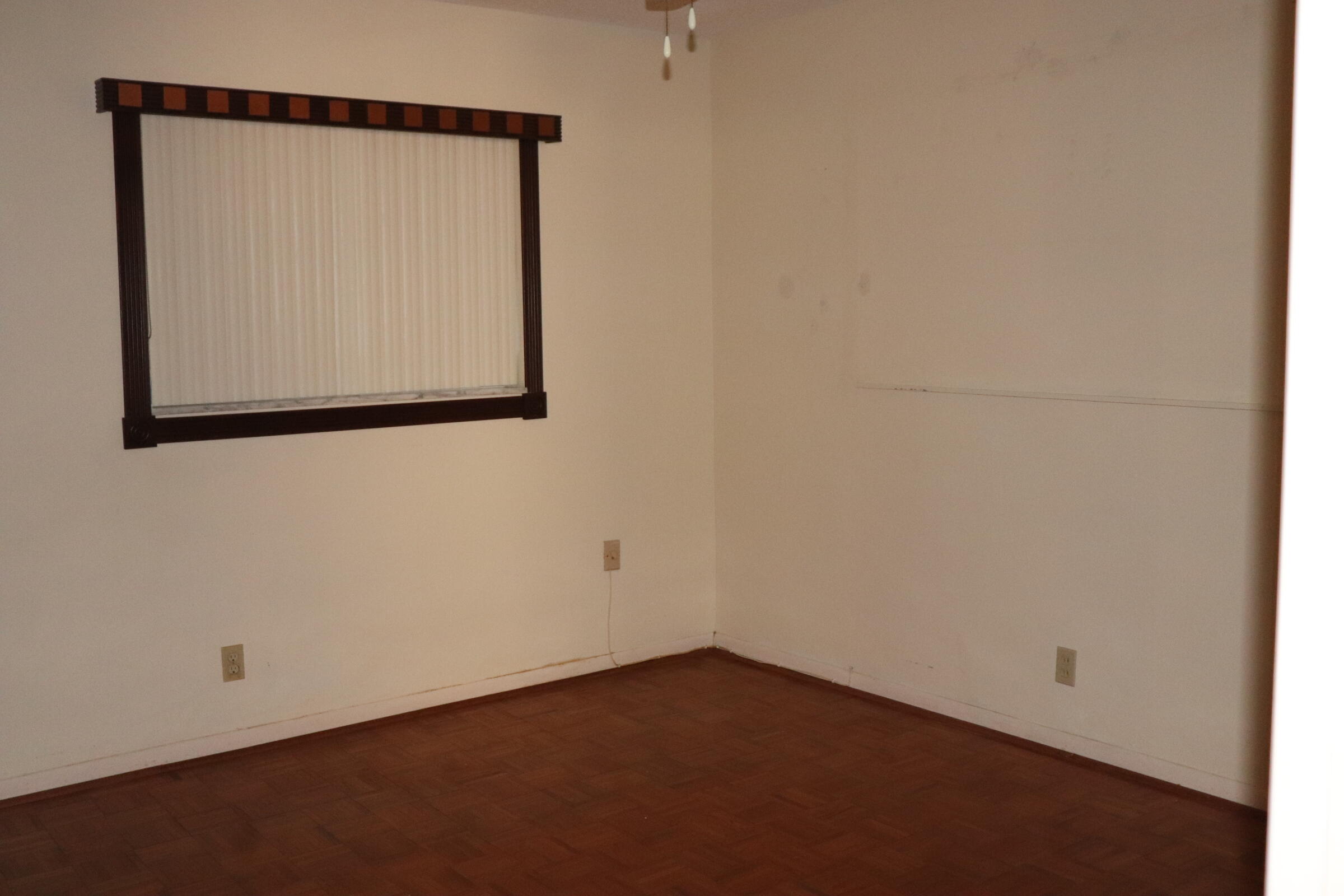 201 Cardinal Lane Delray Beach, FL 33445 - Photo 11 of 20 an empty room with a window