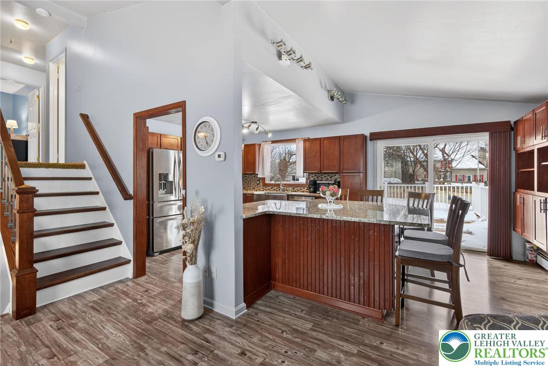 4000 Carter Road Bethlehem, PA 18020 - Photo 14 of 48 a kitchen with stainless steel appliances granite countertop a refrigerator and wooden floor