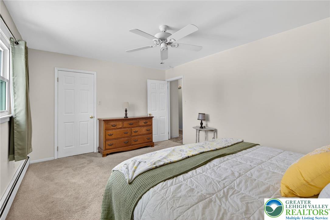 4000 Carter Road Bethlehem, PA 18020 - Photo 23 of 48 a bedroom with a bed and a dresser