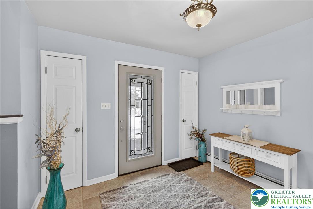 4000 Carter Road Bethlehem, PA 18020 - Photo 3 of 48 a spacious bedroom with a bed and a window