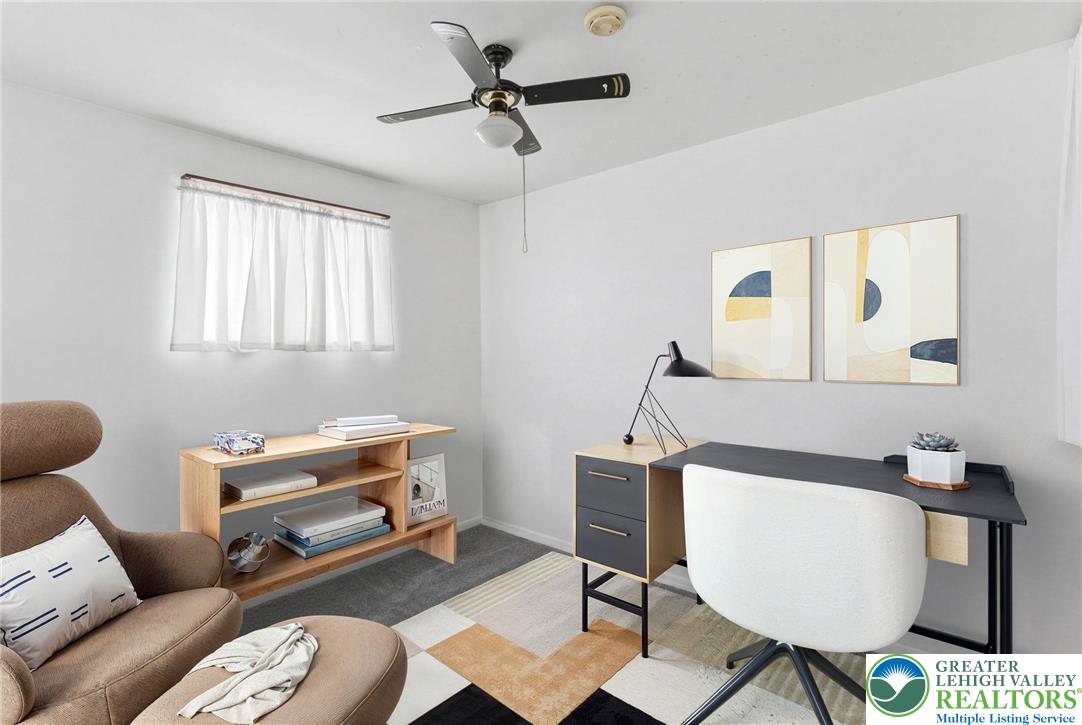 4000 Carter Road Bethlehem, PA 18020 - Photo 31 of 48 a living room with furniture a rug and a window