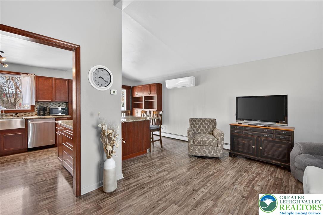 4000 Carter Road Bethlehem, PA 18020 - Photo 10 of 48 a living room with furniture and a flat screen tv