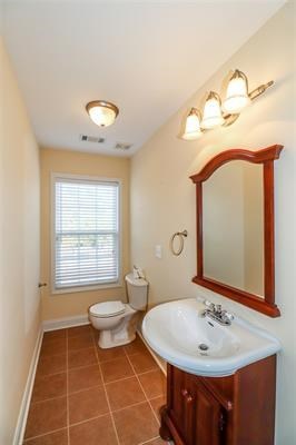 5982 Purple Road Byron, GA 31008 - Photo 27 of 36 a bathroom with a sink and a mirror