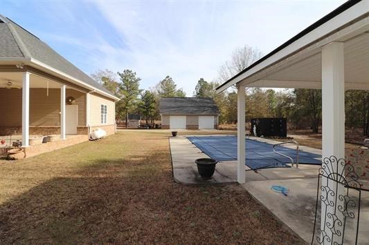 5982 Purple Road Byron, GA 31008 - Photo 32 of 36 a view of a house with backyard and sitting area
