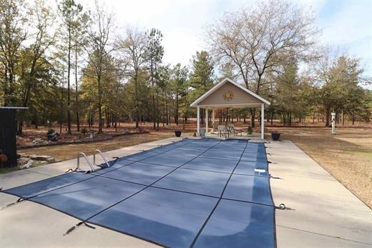 5982 Purple Road Byron, GA 31008 - Photo 33 of 36 a front view of a building with garden