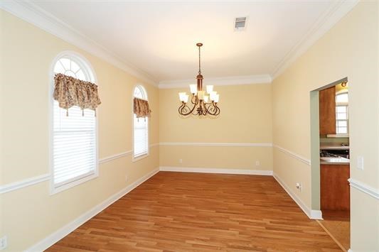 5982 Purple Road Byron, GA 31008 - Photo 7 of 36 a view of empty room with wooden floor and fan