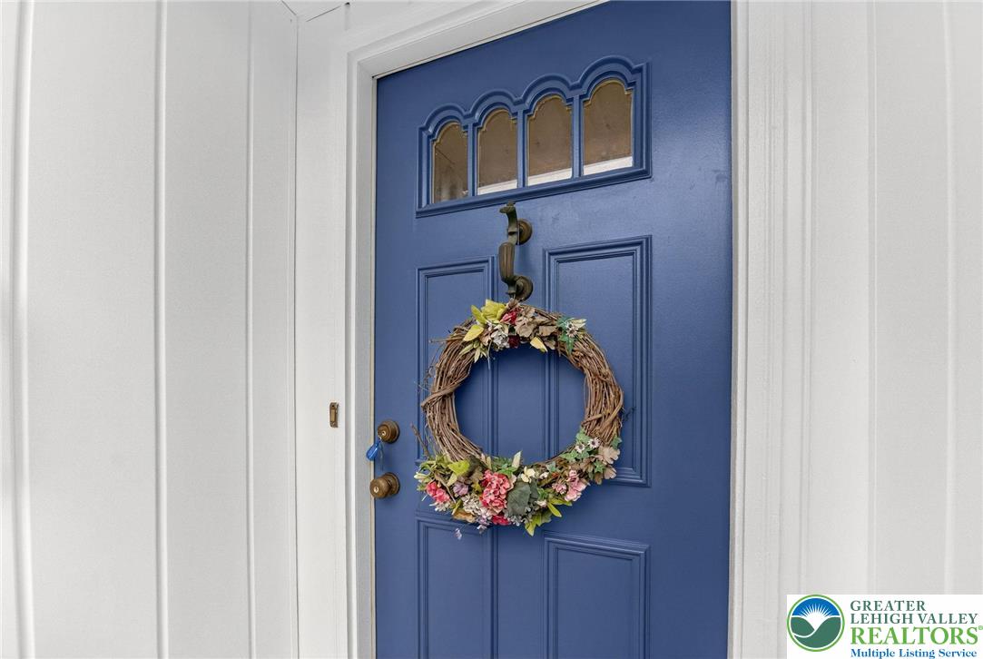 737 Apollo Drive Bethlehem, PA 18017 - Photo 13 of 54 a vase of flowers sitting on a wooden floor