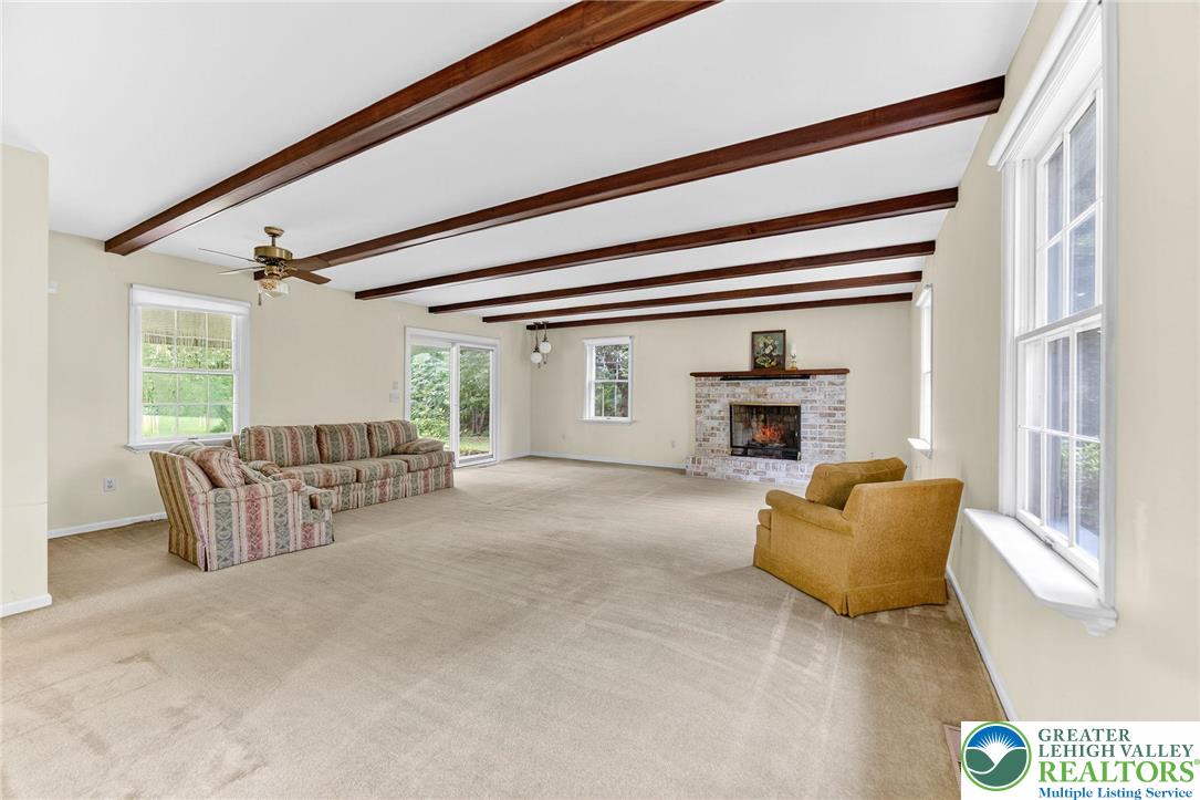 737 Apollo Drive Bethlehem, PA 18017 - Photo 16 of 54 a living room with furniture and a window