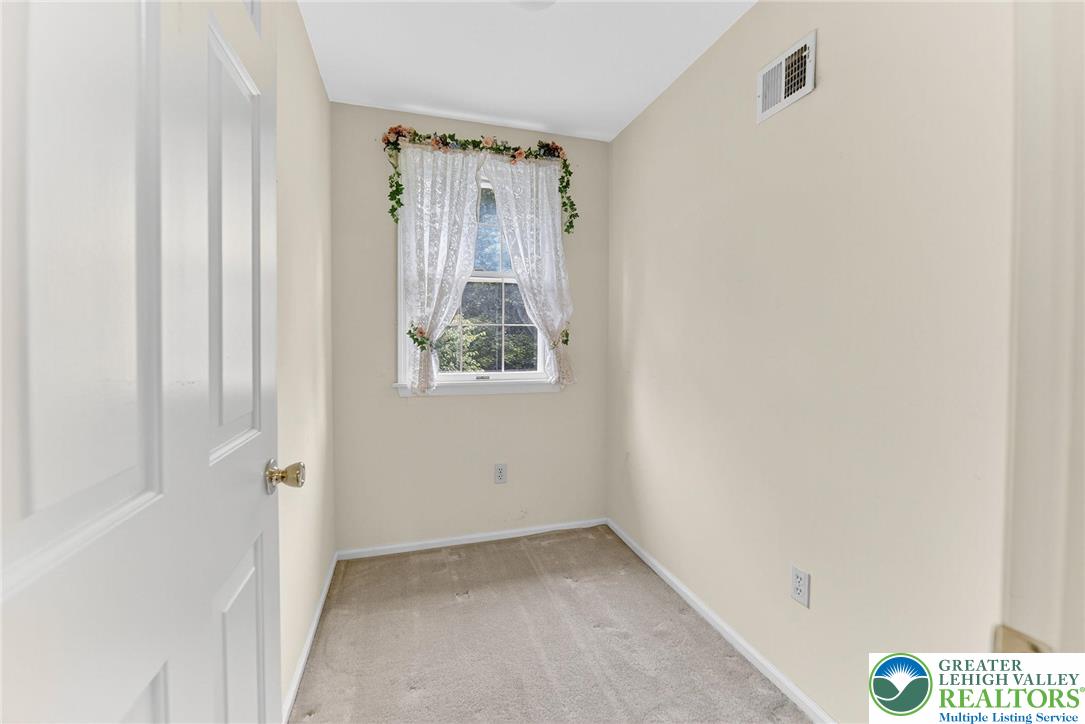 737 Apollo Drive Bethlehem, PA 18017 - Photo 40 of 54 a view of an empty room with a window
