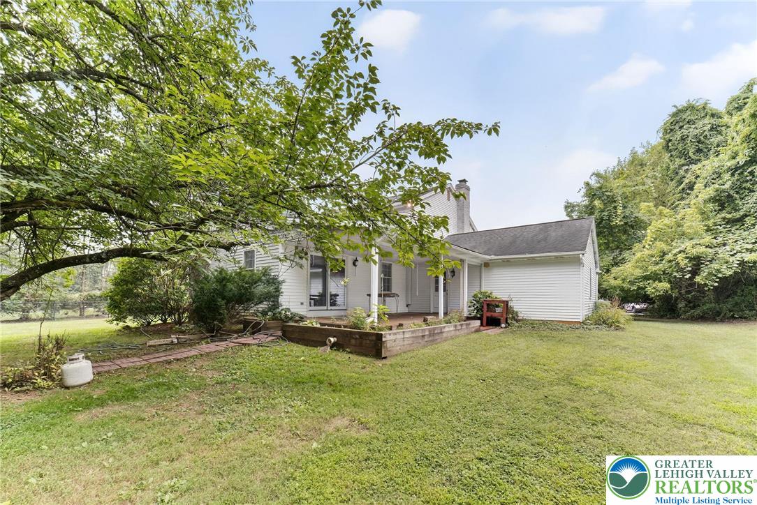 737 Apollo Drive Bethlehem, PA 18017 - Photo 5 of 54 a view of a house with backyard and sitting area
