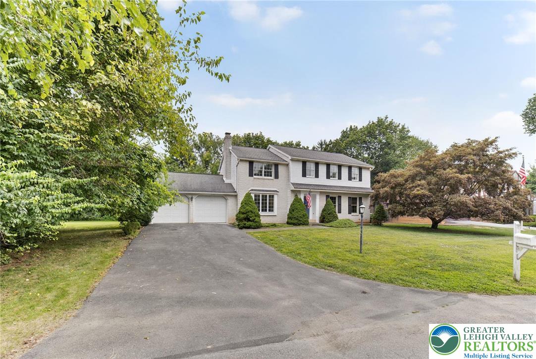 737 Apollo Drive Bethlehem, PA 18017 - Photo 10 of 54 a front view of a house with a yard