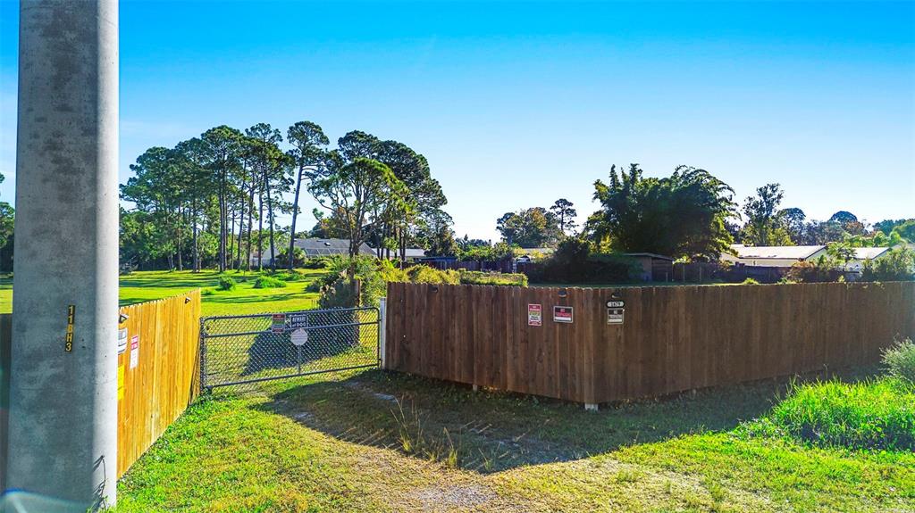 1679 Pinedale Road Edgewater, FL 32132 - Photo 19 of 24 a view of a backyard with a garden