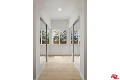 a hallway with a large window