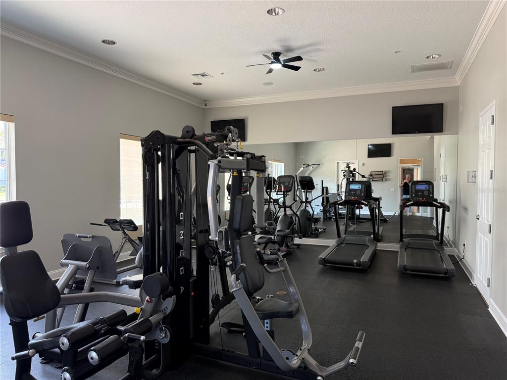 4573 Ada Lane Kissimmee, FL 34746 - Photo 34 of 37 a view of a room with gym equipment