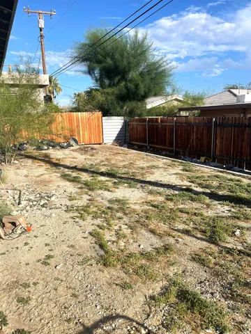 a view of a backyard of a house