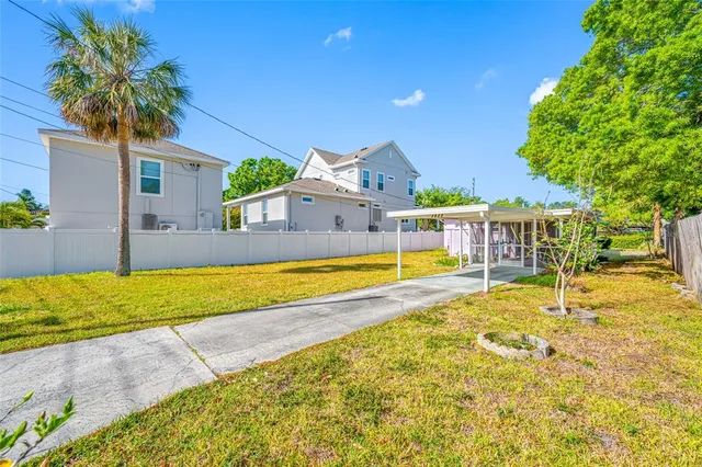 a view of a house with swimming pool