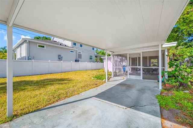 a view of swimming pool with outdoor seating