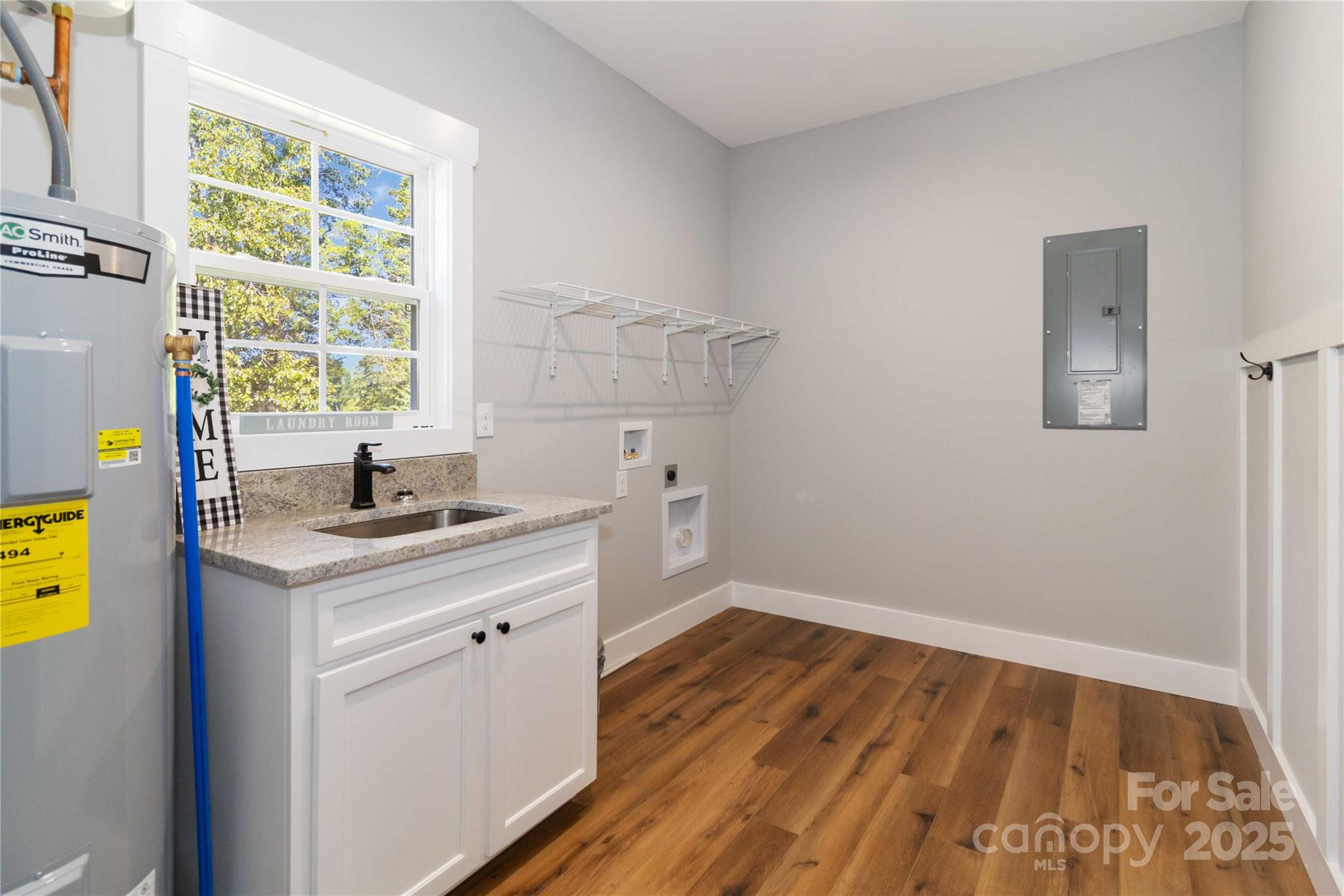 2605 Mt Prospect Road Chester, SC 29706 - Photo 20 of 31 a view of a kitchen with wooden floor and electronic appliances