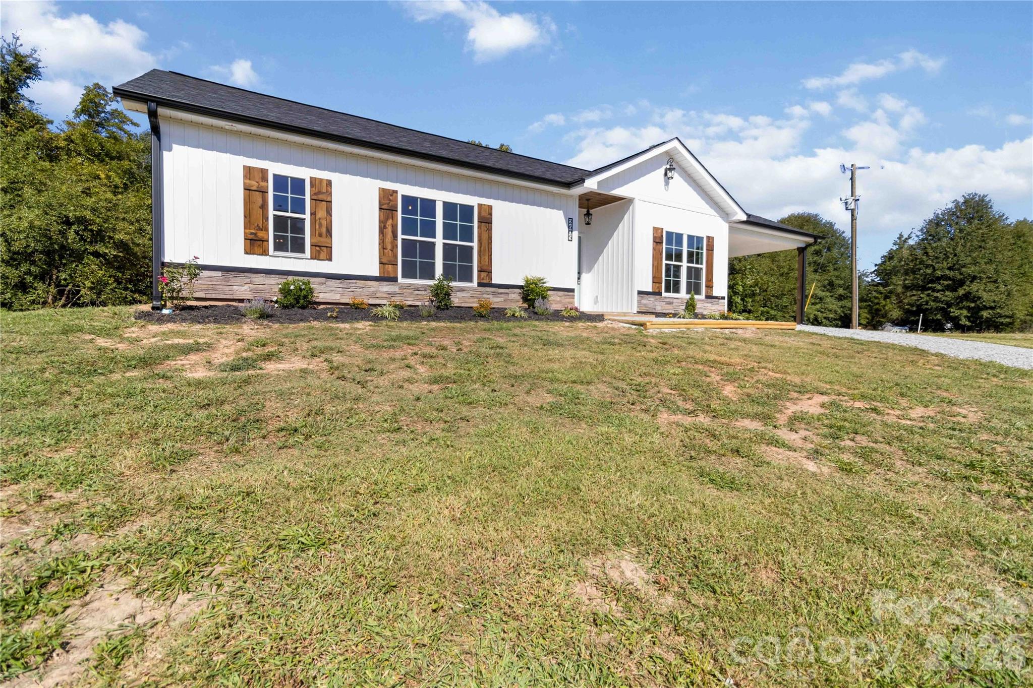 2605 Mt Prospect Road Chester, SC 29706 - Photo 29 of 31 a front view of a house with a yard