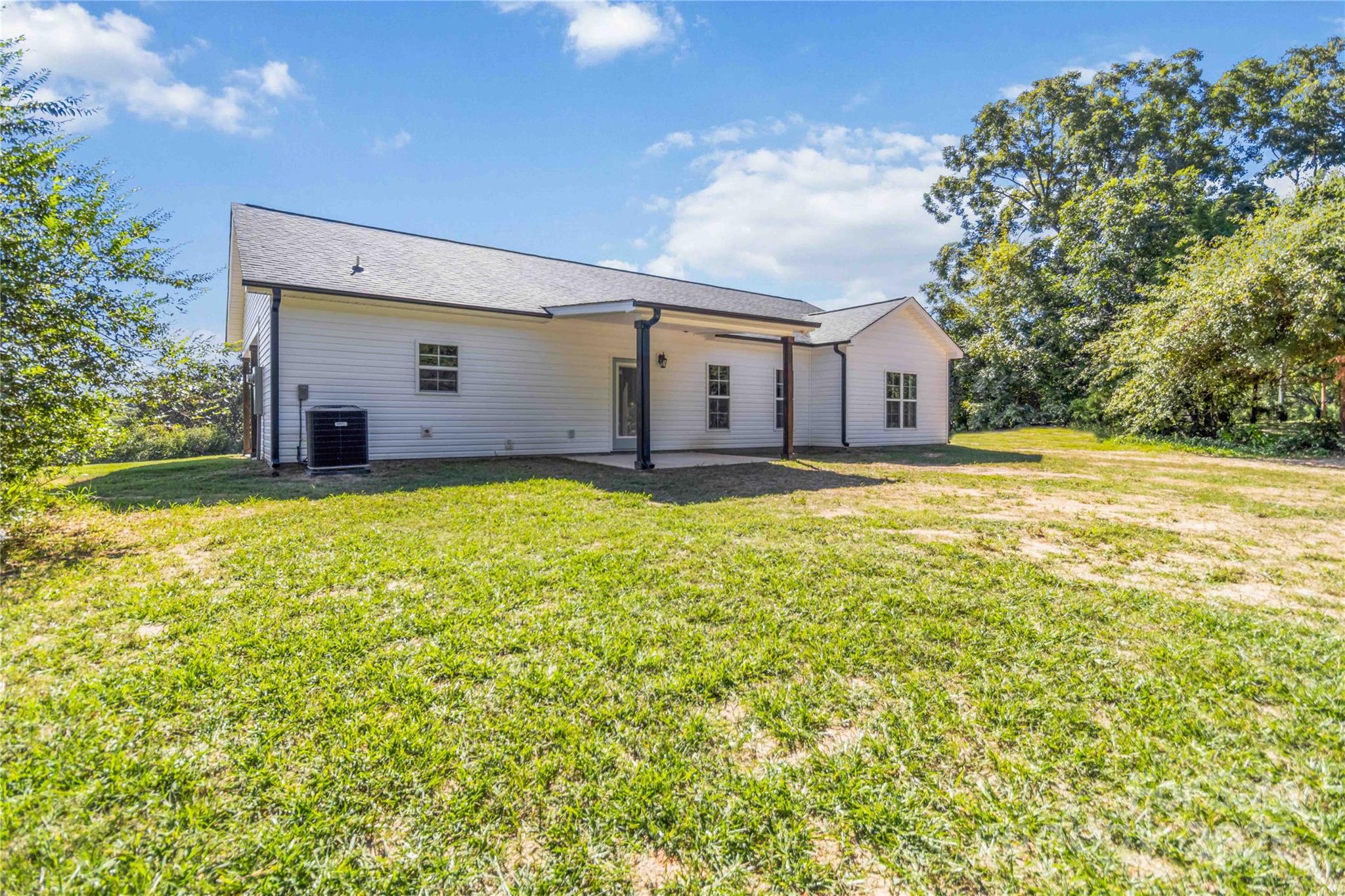 2605 Mt Prospect Road Chester, SC 29706 - Photo 31 of 31 a large house with a big yard and large trees